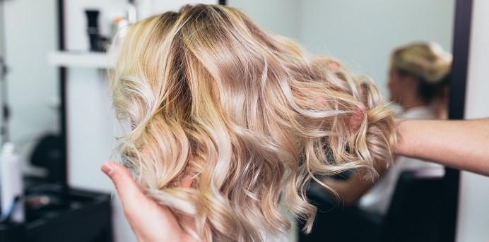 Blonde bob with waves is styled